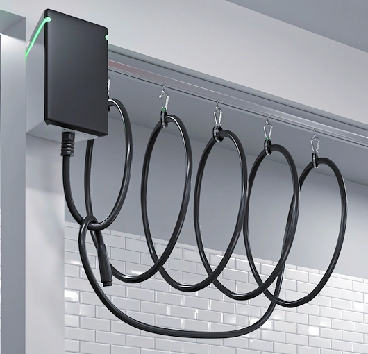 https://www.industrialcurtaintrack.com/wp-content/uploads/2023/01/EV-Charger-Cable-Management-ceiling.webp