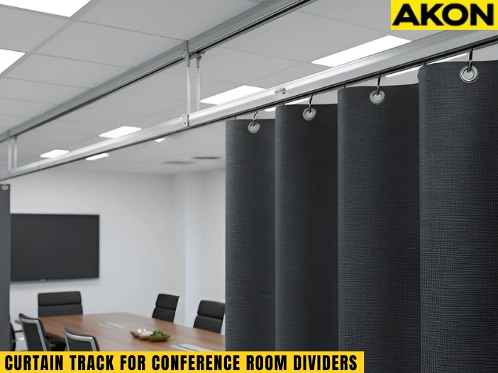 Ceiling mounted curtain track dividing a conference room for flexible privacy