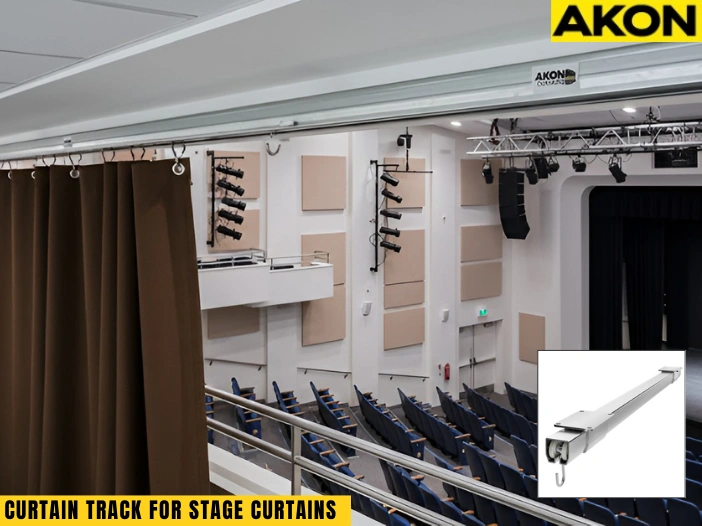 Heavy-duty curtain track for stage curtains supporting large theater drapes