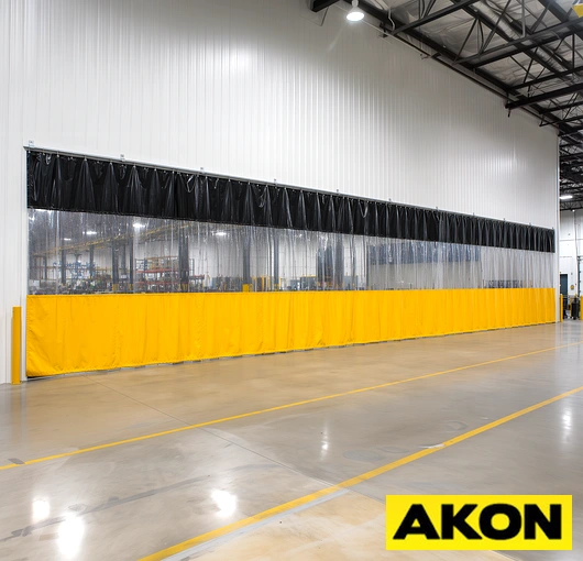 An enclosed ceiling-mount curtain track system installed overhead, designed for suspending industrial or commercial curtain panels.