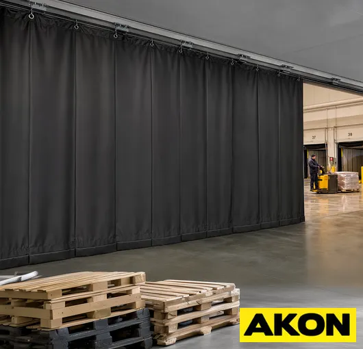 Warehouse divider curtain overhead track system